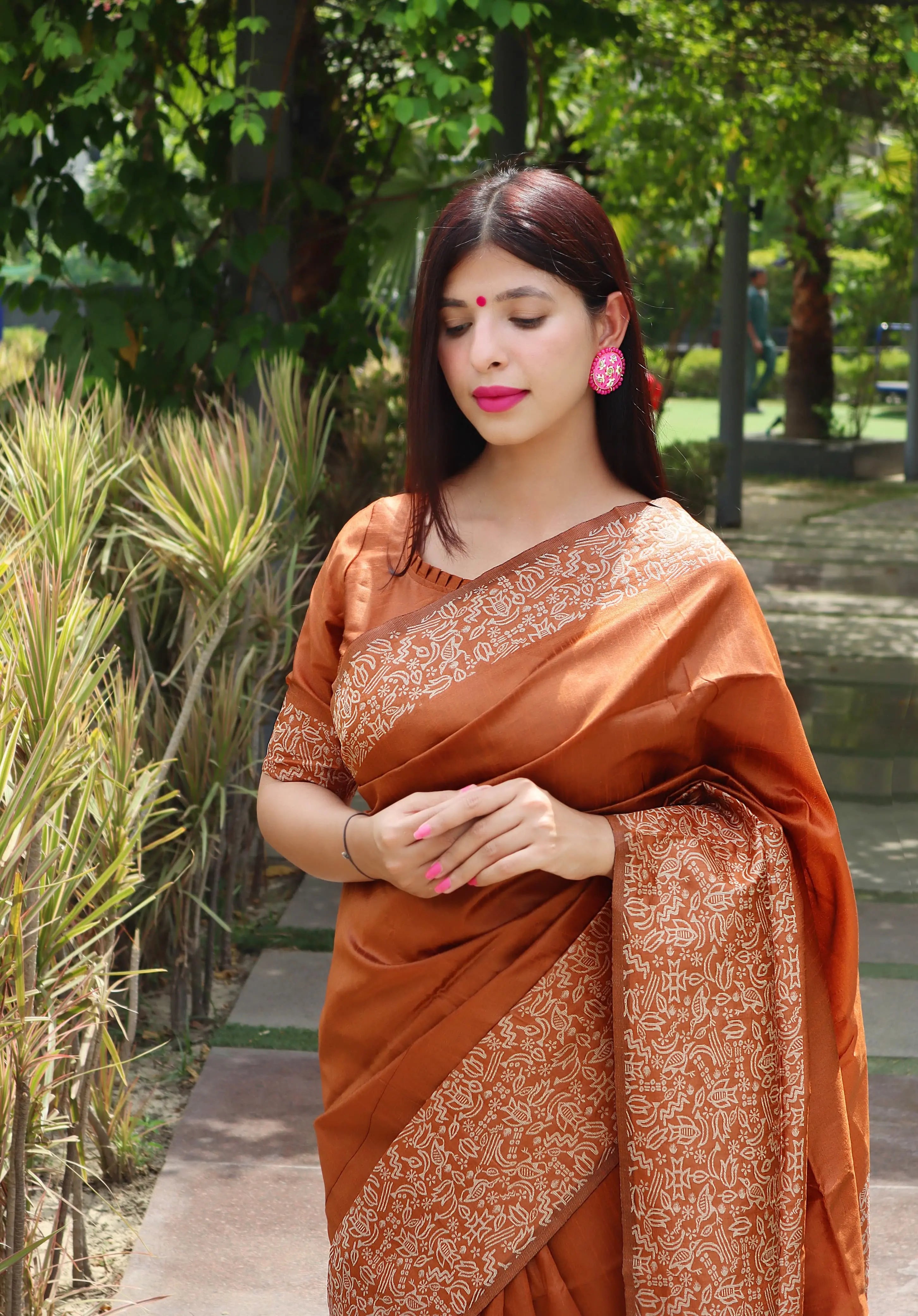 Metallic Brown Warli Weaving Soft Banglori Raw Silk Saree with intricate handloom design, ideal for reception, sangeet, and festive occasions.
